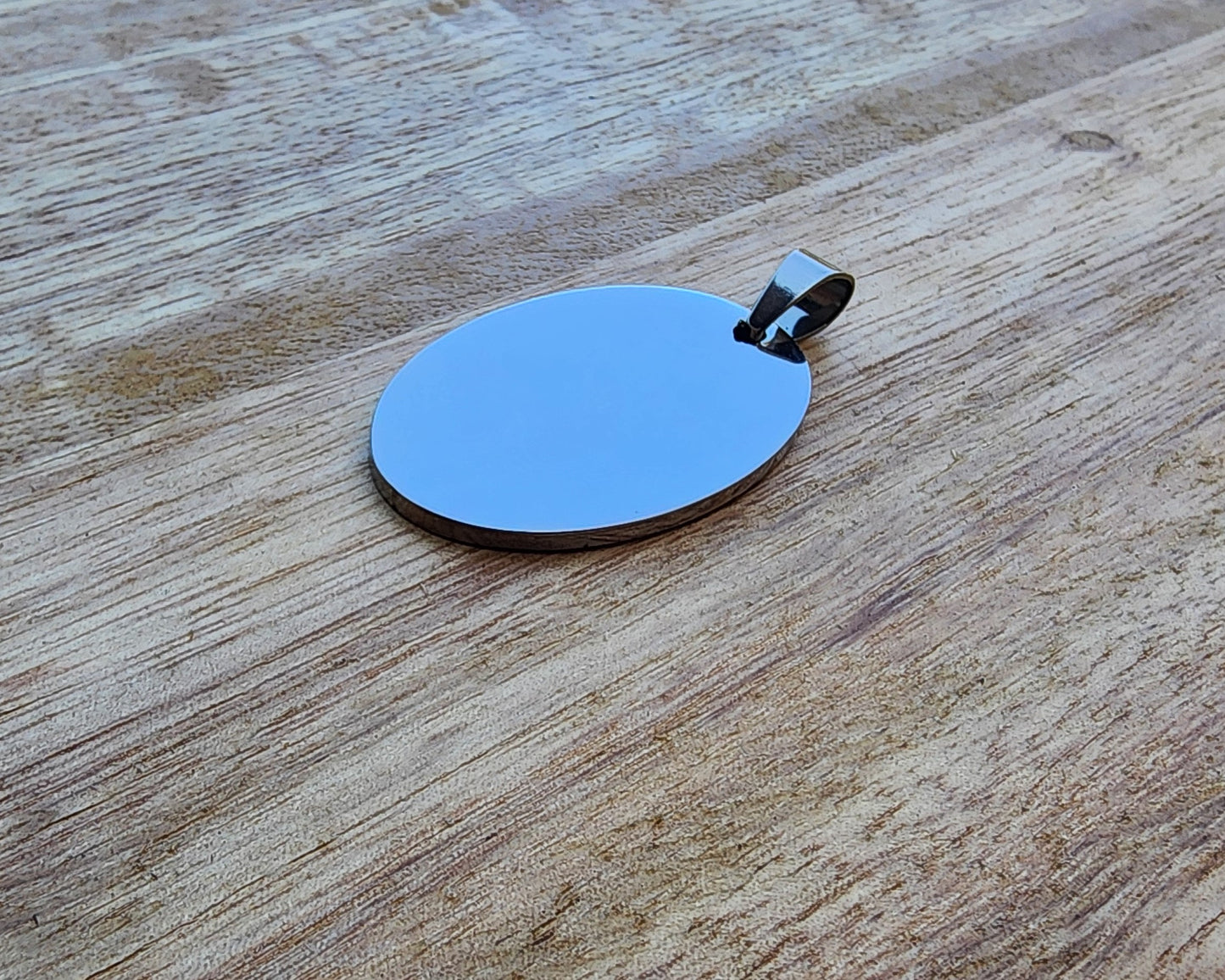 Stainless steel pendant/key ring