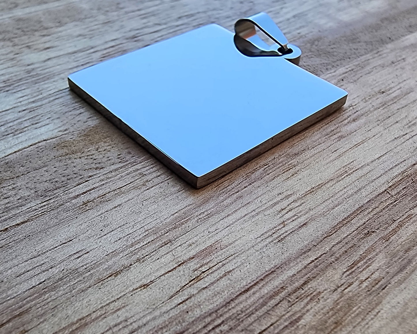 Stainless steel pendant/key ring